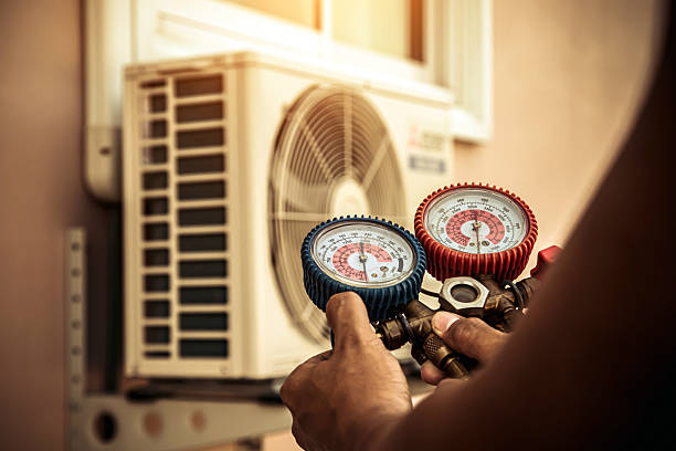 Professional Air Conditioning Service technician working in New Bloomfield, PA